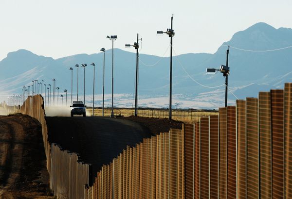US border patrol vehicle rides along the fence at the US-Mexican border near Naco, Mexico, Sunday, Jan. 13, 2008 US border patrol vehicle rides along the fence at the US-Mexican border near Naco, Mexico, Sunday, Jan. 13, 2008 - Sputnik International