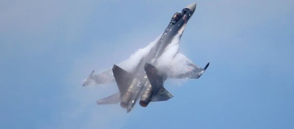 A Sukhoi SU-35 jetfigther performs its demonstration flight during the 50th Paris Air Show at Le Bourget airport, north of Paris, Thursday, June 20, 2013 - Sputnik International