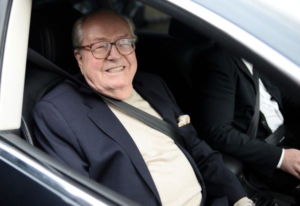 France's far-right party Front National (FN) honorary president Jean-Marie Le Pen smiles as he leaves the party's headquarters in Nanterre, near Paris - Sputnik International