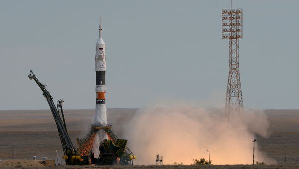 Soyuz TMA-18M launches from Baikonur Cosmodrome to take the long-duration expedition 45/46 to the International Space Station. Soyuz TMA-18M launches from Baikonur Cosmodrome to take the long-duration expedition 45/46 to the International Space Station. - Sputnik International