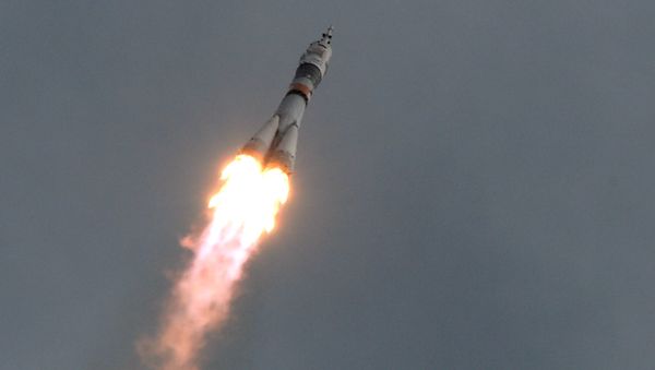 Soyuz TMA-18M launches from Baikonur Cosmodrome to take the long-duration expedition 45/46 to the International Space Station. - Sputnik International
