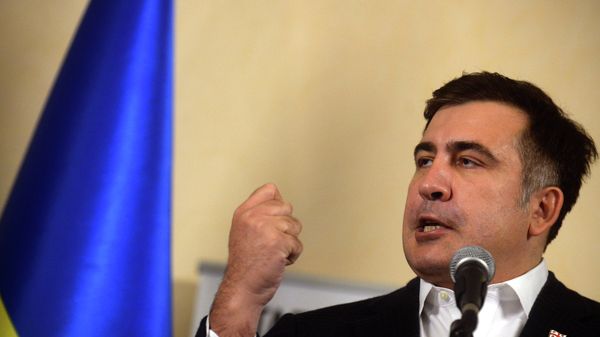 Former Georgian President Mikheil Saakashvili gestures as gives a press conference at the headquarters of the opposition in Kiev on December 7, 2013 Former Georgian President Mikheil Saakashvili gestures as gives a press conference at the headquarters of the opposition in Kiev on December 7, 2013 - Sputnik International