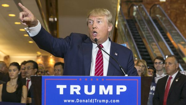US presidential hopeful Donald Trump speaks during a press availability after signing a pledge with the Republican National Committee (RNC) at Trump Tower in Manhattan, New York September 3, 2015 US presidential hopeful Donald Trump speaks during a press availability after signing a pledge with the Republican National Committee (RNC) at Trump Tower in Manhattan, New York September 3, 2015 - Sputnik International