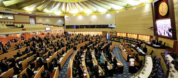 Thailand's legislature, known as the National Reform Council, stands after they votee 135 against vs. 105 in favor with seven abstentions on the new draft constitution Sunday, Sept. 6, 2015, in Bangkok, Thailand Thailand's legislature, known as the National Reform Council, stands after they votee 135 against vs. 105 in favor with seven abstentions on the new draft constitution Sunday, Sept. 6, 2015, in Bangkok, Thailand - Sputnik International