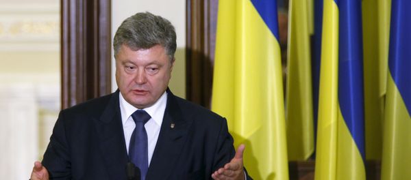 Ukrainian President Petro Poroshenko speaks during a news conference after a meeting with International Monetary Fund (IMF) Managing Director Christine Lagarde (not pictured) in Kiev, Ukraine, September 6, 2015 - Sputnik International