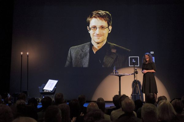 A chair is pictured on stage as former US National Security Agency contractor Edward Snowden. A chair is pictured on stage as former US National Security Agency contractor Edward Snowden. - Sputnik International