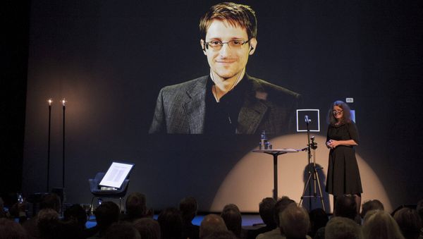 A chair is pictured on stage as former US National Security Agency contractor Edward Snowden. A chair is pictured on stage as former US National Security Agency contractor Edward Snowden. - Sputnik International