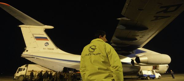 Russian plane with humanitarian aid arrives in Syria Russian plane with humanitarian aid arrives in Syria - Sputnik International