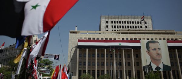 Portrait of President Bashar al-Assad on the Bank of Syria building in Damascus. Portrait of President Bashar al-Assad on the Bank of Syria building in Damascus. - Sputnik International