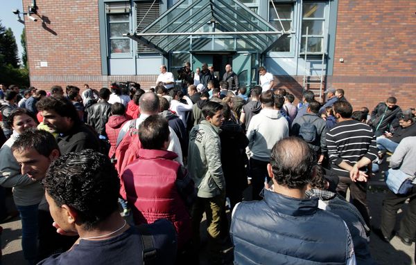 People wait outside a registration center for migrants and refugees in Berlin, Germany, Thursday, Sept. 10, 2015. People wait outside a registration center for migrants and refugees in Berlin, Germany, Thursday, Sept. 10, 2015. - Sputnik International