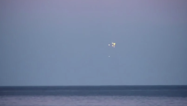 UFOs Enter The Baltic Sea Caught On Video! September 2014 - Sputnik International