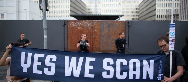 Demonstrators hold a banner during a protest against the supposed surveillance by the US National Security Agency, NSA, and the German intelligence agency, BND, during a rally in front of the construction site of the new headquarters of German intelligence agency in Berlin, Germany, Monday July 29, 2013. Demonstrators hold a banner during a protest against the supposed surveillance by the US National Security Agency, NSA, and the German intelligence agency, BND, during a rally in front of the construction site of the new headquarters of German intelligence agency in Berlin, Germany, Monday July 29, 2013. - Sputnik International