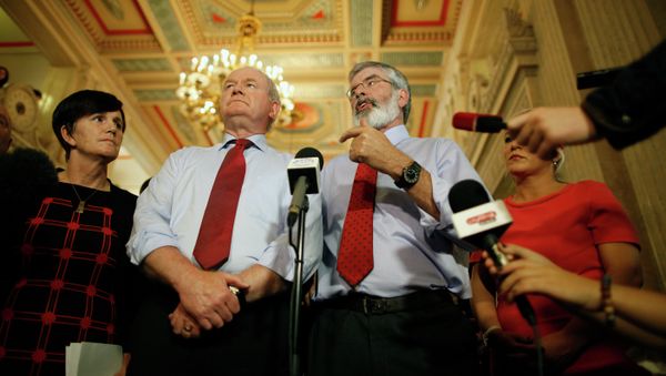 Sinn Fein party leader Gerry Adams, right, and Martin McGuinness speak to the media at Parliament Buildings, Stormont, Belfast, Northern Ireland, Thursday, Sept. 10, 2015. Sinn Fein party leader Gerry Adams, right, and Martin McGuinness speak to the media at Parliament Buildings, Stormont, Belfast, Northern Ireland, Thursday, Sept. 10, 2015. - Sputnik International