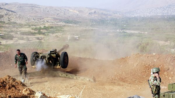 Syrian troops shoot at the Islamist forces' positions near Al-Zabadani in Syria Syrian troops shoot at the Islamist forces' positions near Al-Zabadani in Syria - Sputnik International