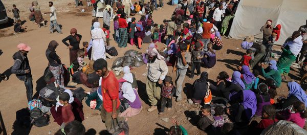 Displaced Iraqis from the Yazidi community arrive at Nowruz camp, in Derike, Syria, Tuesday, Aug. 12, 2014 - Sputnik International