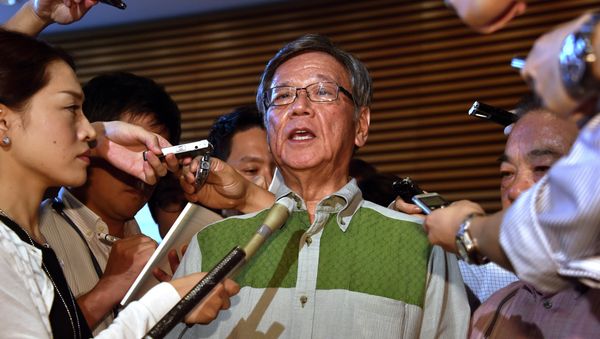 Okinawa Gov. Takeshi Onaga, center, speaks to the media after meeting with Japanese Prime Minister Shinzo Abe at Abe's office in Tokyo Friday, Aug. 7, 2015 Okinawa Gov. Takeshi Onaga, center, speaks to the media after meeting with Japanese Prime Minister Shinzo Abe at Abe's office in Tokyo Friday, Aug. 7, 2015 - Sputnik International