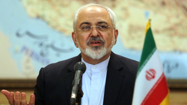 Iranian Foreign Minister Mohammad Javad Zarif and the head of Iran's Atomic Energy Organization Ali Akbar Salehi (unseen) give a press conference at Tehran's Mehrabad Airport following their arrival on July 15, 2015, after Iran's nuclear negotiating team struck a deal with world powers in Vienna Iranian Foreign Minister Mohammad Javad Zarif and the head of Iran's Atomic Energy Organization Ali Akbar Salehi (unseen) give a press conference at Tehran's Mehrabad Airport following their arrival on July 15, 2015, after Iran's nuclear negotiating team struck a deal with world powers in Vienna - Sputnik International