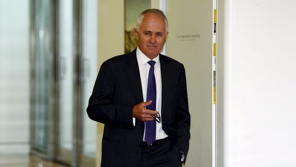 Federal Communications Minister Malcolm Turnbull walks out of a government party room meeting in Canberra's Parliament House in this file picture taken February 9, 2015. Federal Communications Minister Malcolm Turnbull walks out of a government party room meeting in Canberra's Parliament House in this file picture taken February 9, 2015. - Sputnik International