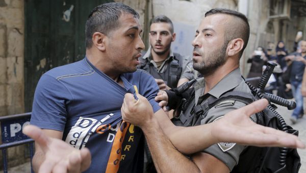 Israeli border police officers detain a Palestinian protester in Jerusalem's Old City Israeli border police officers detain a Palestinian protester in Jerusalem's Old City - Sputnik International