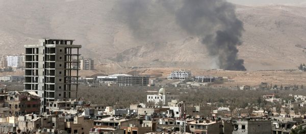 Smoke rises during clashes between forces loyal to Syria's President Bashar al-Assad and the Army of Islam fighters Smoke rises during clashes between forces loyal to Syria's President Bashar al-Assad and the Army of Islam fighters - Sputnik International