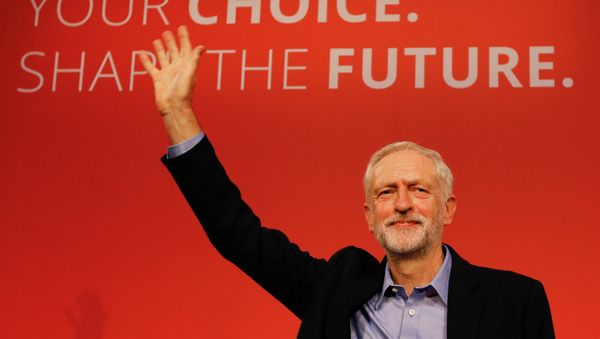 Jeremy Corbyn waves on stage after new is announced as the new leader of The Labour Party during the Labour Party Leadership Conference in London. Jeremy Corbyn waves on stage after new is announced as the new leader of The Labour Party during the Labour Party Leadership Conference in London. - Sputnik International