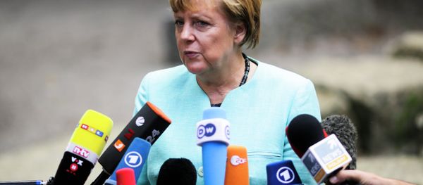 German Chancellor Angela Merkel, speaks to media after a visit of a so called 'Welcome Class', a special school class for migrants and refugees at the Ferdinand-Freiligrath school in Berlin, Germany, Thursday, Sept. 10, 2015. - Sputnik International