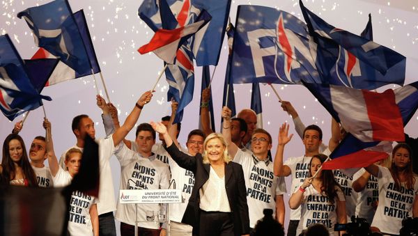 France’s far-right National Front president Marine Le Pen, center, surrounded by members, waves to supporters after her speech during their meeting in Marseille, southern France, Saturday, Sep. 6, 2015. France’s far-right National Front president Marine Le Pen, center, surrounded by members, waves to supporters after her speech during their meeting in Marseille, southern France, Saturday, Sep. 6, 2015. - Sputnik International