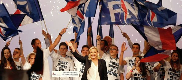 France’s far-right National Front president Marine Le Pen, center, surrounded by members, waves to supporters after her speech during their meeting in Marseille, southern France, Saturday, Sep. 6, 2015. France’s far-right National Front president Marine Le Pen, center, surrounded by members, waves to supporters after her speech during their meeting in Marseille, southern France, Saturday, Sep. 6, 2015. - Sputnik International