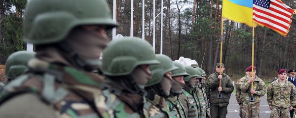 US and Ukrainian soldiers attend an opening ceremony of the joint Ukrainian-US military exercise 'Fearless Guardian' in Ukraine. File photo US and Ukrainian soldiers attend an opening ceremony of the joint Ukrainian-US military exercise 'Fearless Guardian' in Ukraine. File photo - Sputnik International