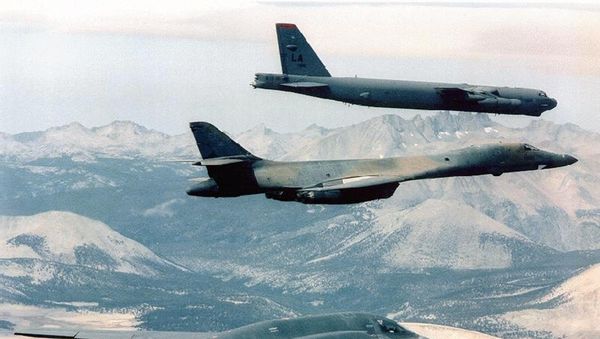 B-2 Spirit (bottom) bomber flying with B-1B (C) and B-52 bombers at an undisclosed location over Afghanistan, file photo. - Sputnik International