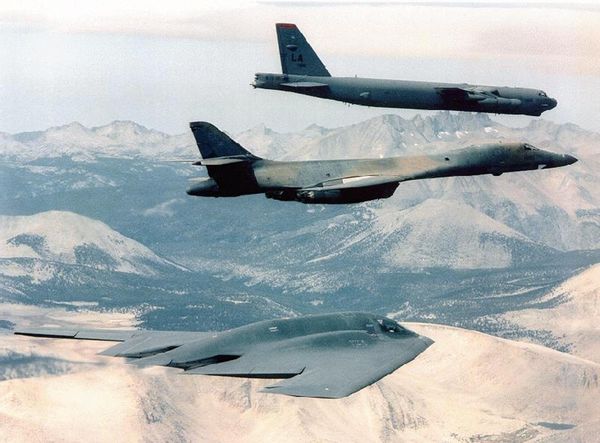 B-2 Spirit (bottom) bomber flying with B-1B (C) and B-52 bombers at an undisclosed location over Afghanistan, file photo. B-2 Spirit (bottom) bomber flying with B-1B (C) and B-52 bombers at an undisclosed location over Afghanistan, file photo. - Sputnik International