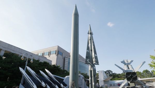 Visitors looks at models of North Korea's Scud-B missile, center left, and other South Korean missiles on display at the Korea War Memorial Museum in Seoul. - Sputnik International