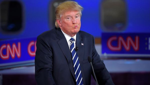 Republican presidential candidate, businessman Donald Trump reacts during the CNN Republican presidential debate. Republican presidential candidate, businessman Donald Trump reacts during the CNN Republican presidential debate. - Sputnik International