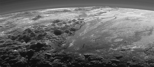 A close-up view of the rugged, icy mountains and flat ice plains on Pluto is seen in an image from NASA's New Horizons spacecraft A close-up view of the rugged, icy mountains and flat ice plains on Pluto is seen in an image from NASA's New Horizons spacecraft - Sputnik International