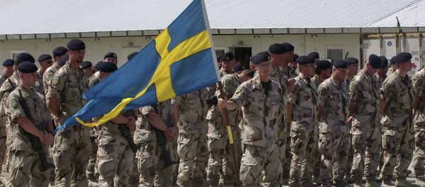 Swedish soldiers part of the International Security Assistant Force (ISAF) stand during a changing of command ceremony at the Swedish run Provincial Reconstruction Team in Mazar Sharif north of Kabul, Afghanistan on Tuesday May 6, 2008 Swedish soldiers part of the International Security Assistant Force (ISAF) stand during a changing of command ceremony at the Swedish run Provincial Reconstruction Team in Mazar Sharif north of Kabul, Afghanistan on Tuesday May 6, 2008 - Sputnik International