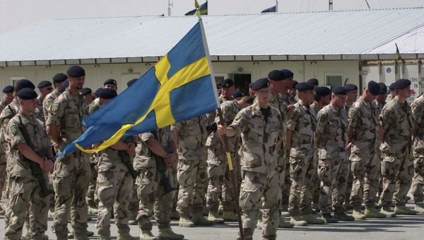 Swedish soldiers part of the International Security Assistant Force (ISAF) stand during a changing of command ceremony at the Swedish run Provincial Reconstruction Team in Mazar Sharif north of Kabul, Afghanistan on Tuesday May 6, 2008 Swedish soldiers part of the International Security Assistant Force (ISAF) stand during a changing of command ceremony at the Swedish run Provincial Reconstruction Team in Mazar Sharif north of Kabul, Afghanistan on Tuesday May 6, 2008 - Sputnik International