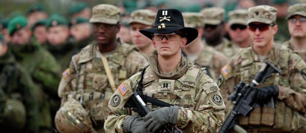 Members of the U.S. Army B Company, 2nd Battalion, 8th Cavalry Regiment, 1st Brigade Combat Team, 1st Cavalry Division attend a military exercise 'Iron Sword 2014', at the Gaiziunu Training Range in Pabrade some 60km.(38 miles) north of the capital Vilnius, Lithuania, Thursday, Nov. 13, 2014 Members of the U.S. Army B Company, 2nd Battalion, 8th Cavalry Regiment, 1st Brigade Combat Team, 1st Cavalry Division attend a military exercise 'Iron Sword 2014', at the Gaiziunu Training Range in Pabrade some 60km.(38 miles) north of the capital Vilnius, Lithuania, Thursday, Nov. 13, 2014 - Sputnik International