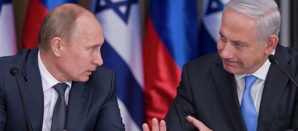 Russian President Vladimir Putin, left, listens to his host Israeli Prime Minister Benjamin Netanyahu as they prepare to deliver joint statements after their meeting and a lunch in the Israeli leader's Jerusalem residence, Monday, June 25, 2012 Russian President Vladimir Putin, left, listens to his host Israeli Prime Minister Benjamin Netanyahu as they prepare to deliver joint statements after their meeting and a lunch in the Israeli leader's Jerusalem residence, Monday, June 25, 2012 - Sputnik International