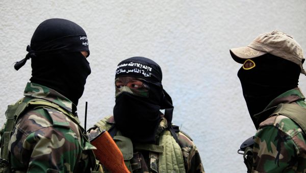 Palestinian militants attend the funeral of Mohammed al-Awor, 33, in Beit Lahia, northern Gaza Strip, on Thursday, June 12, 2014. - Sputnik International