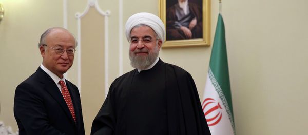 Iranian President Hassan Rouhani, center, welcomes U.N. nuclear chief Yukiya Amano at the start of their meeting in Tehran, Iran, Sunday, Sept. 20, 2015 Iranian President Hassan Rouhani, center, welcomes U.N. nuclear chief Yukiya Amano at the start of their meeting in Tehran, Iran, Sunday, Sept. 20, 2015 - Sputnik International