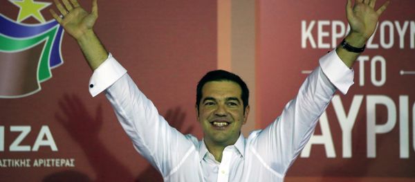 Alexis Tsipras the leader of left-wing Syriza party waves to his supporters after the election results at the party’s main electoral center in Athens, Sunday, Sept. 20, 2015. Alexis Tsipras the leader of left-wing Syriza party waves to his supporters after the election results at the party’s main electoral center in Athens, Sunday, Sept. 20, 2015. - Sputnik International