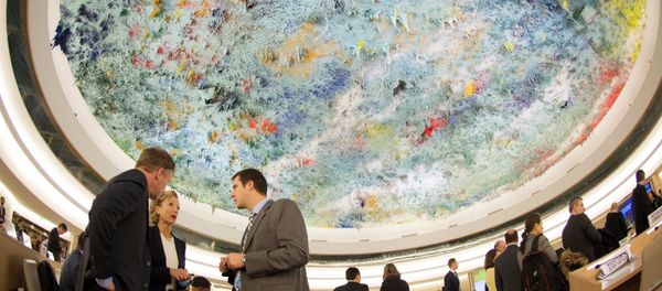 Delegates are seen beneath a ceiling painted by Spanish artist Miquel Barcelo during 28th Human Rights Council at the United Nations headquarters in Geneva on March 2, 2015. - Sputnik International