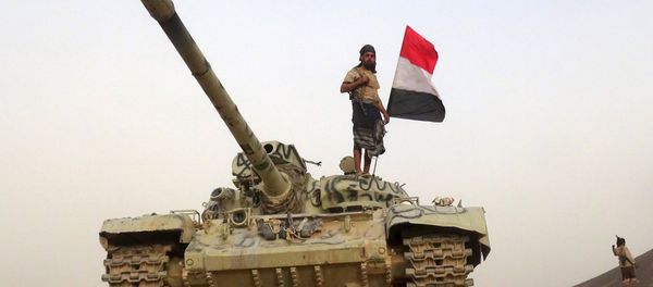 A soldier loyal to Yemen's government rides on a tank in the frontline province of Marib, September 19, 2015. A soldier loyal to Yemen's government rides on a tank in the frontline province of Marib, September 19, 2015. - Sputnik International