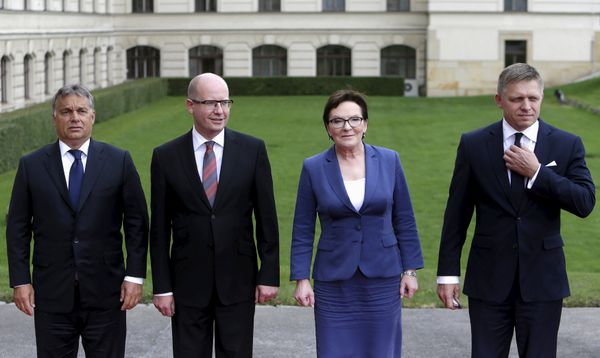 Prime Ministers of the Visegrad Group (V4), Hungary's Prime Minister Viktor Orban (L-R), Czech Republic's Prime Minister Bohuslav Sobotka, Poland's Prime Minister Ewa Kopacz and Slovakia's Prime Minister Robert Fico pose for a group photo during an extraordinary Visegrad Group summit aimed at resolving the migration crisis in Prague, Czech Republic, September 4, 2015.  - Sputnik International
