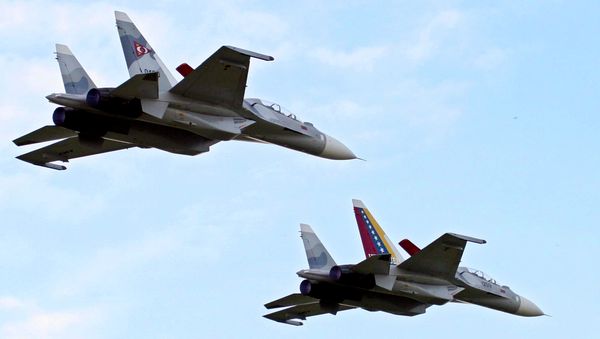 Venezuela's two Sukhoi fighter jets fly during the anniversary celebration of Venezuela's Air Force in Maracay, Venezuela, Venezuela's two Sukhoi fighter jets fly during the anniversary celebration of Venezuela's Air Force in Maracay, Venezuela, - Sputnik International