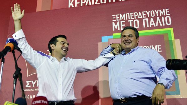 Syriza leader Alexis Tsipras (L) celebrates with Independent Greeks (ANEL) party leader Panos Kamenos after his party's victory in the Greek general elections at his campaign headquarters in Athens on September 20, 2015 Syriza leader Alexis Tsipras (L) celebrates with Independent Greeks (ANEL) party leader Panos Kamenos after his party's victory in the Greek general elections at his campaign headquarters in Athens on September 20, 2015 - Sputnik International