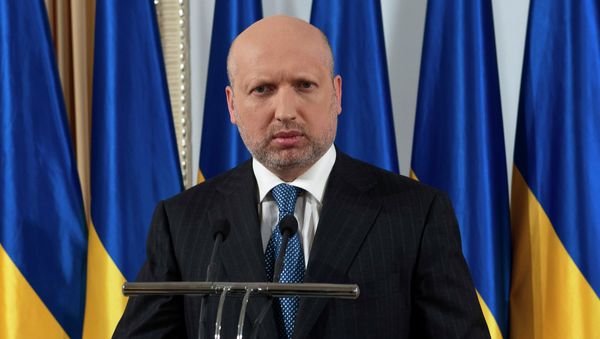 Ukrainian acting President Oleksandr Turchynov addresses the nation in a live TV broadcast in Kiev, Ukraine, Thursday, April 24, 2014 - Sputnik International