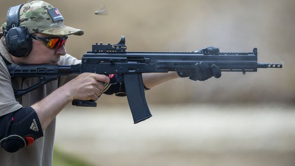 Demo firing a Saiga 12 smoothbore autoloading shotgun Demo firing a Saiga 12 smoothbore autoloading shotgun - Sputnik International