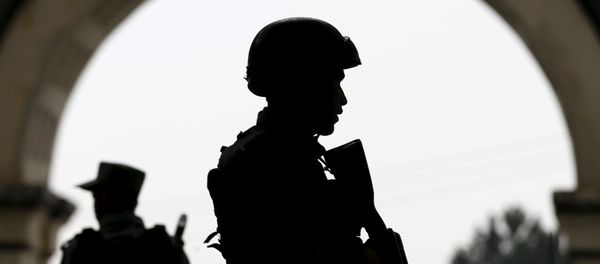Afghan security forces stand guard. - Sputnik International