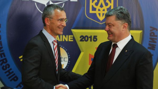 NATO Secretary General Jens Stoltenberg (at the left) and the president of Ukraine Petro Poroshenko at a press conference in the International center of peacemaking and safety on the Yavorivsky ground NATO Secretary General Jens Stoltenberg (at the left) and the president of Ukraine Petro Poroshenko at a press conference in the International center of peacemaking and safety on the Yavorivsky ground - Sputnik International